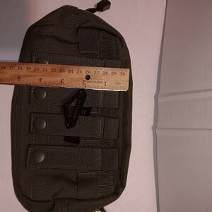 Tactical pouch. Olive color. Please carefully review photos for measurements.
